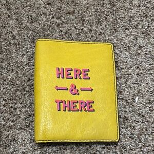 Fossil Yellow Passspoet Wallet with Pink Text